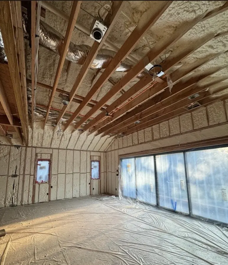 Interior walls and ceiling insulated with spray foam during new construction in Wake Village